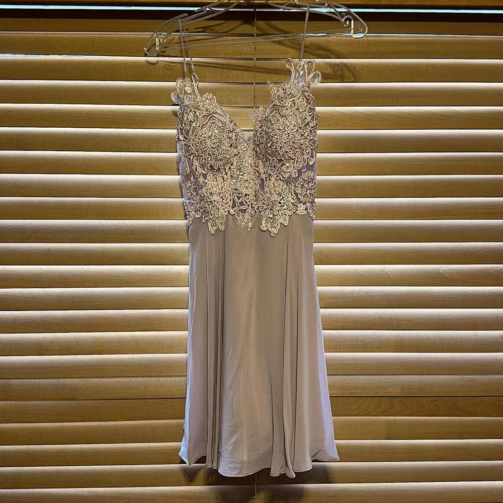 Homecoming dress: size 2,not sure on the brand but from promgirl, color is mauve